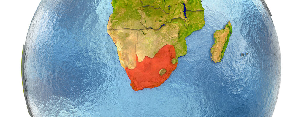 Vihreä Afrikan kartta, jossa Etelä-Africca korostettu punaisella värillä.